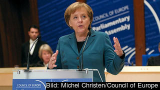 Angela Merkel backar om IMF-lån. Angela Merkel backar om IMF-lån.